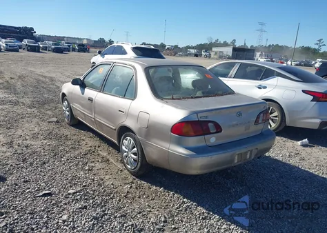 1999 Toyota Corolla Le z USA, uszkodzony, nr VIN 2T1BR12E6XC161465